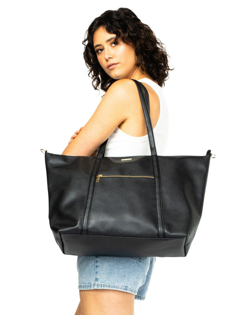 Model with Rusty Aaliyah Weekender bag 