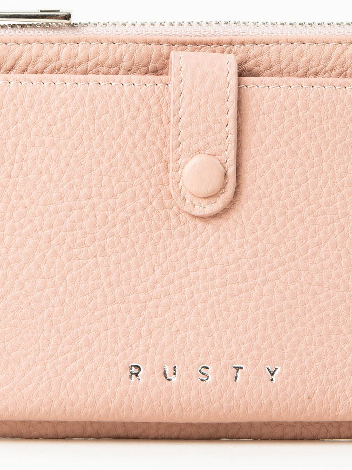 Rusty Grace Leather Pouch features RFID blocking & zip closure. 